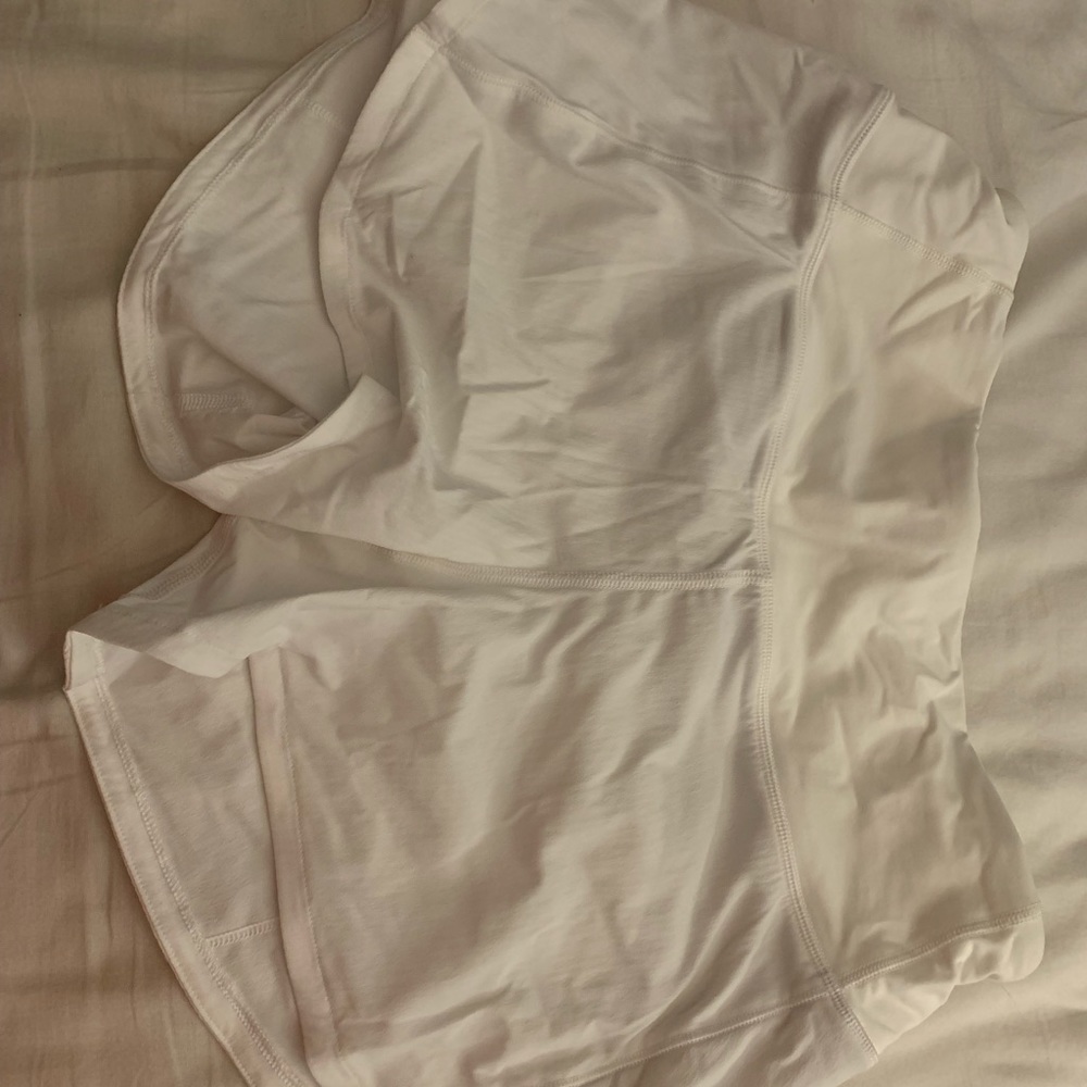 white tall lululemon shorts